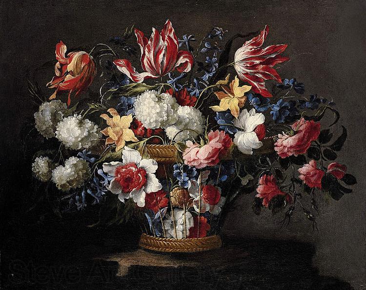 Juan de Arellano roses and other flowers in a wicker basket on a ledge